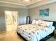 Spacious main bedroom featuring ensuite bathroom, neutral walls, and ceiling fan at 2311 Verde Creek Rd, Charlotte, NC 28214
