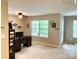 Office space with a ceiling fan, desk and shelving at 2311 Verde Creek Rd, Charlotte, NC 28214