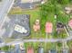 Birds-eye view of neighborhood homes featuring tree-lined streets and walkable community amenities at 3 Circle Dr, Lincolnton, NC 28092