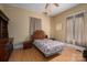 Bedroom with hardwood floors, neutral walls, a ceiling fan, and natural light at 3 Circle Dr, Lincolnton, NC 28092