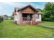 Classic one-story home featuring a welcoming front porch and a well-kept green lawn at 3 Circle Dr, Lincolnton, NC 28092