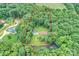 This property boasts a private and spacious lot, surrounded by lush greenery and mature trees providing a serene and natural setting at 3017 Brooks Mill Ln # 10, Wingate, NC 28174
