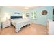Comfortable bedroom with a queen-sized bed, light hardwood floors, and natural light from the window at 3017 Brooks Mill Ln # 10, Wingate, NC 28174