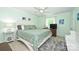 Serene bedroom with mint green walls, ceiling fan, and a comfortable queen size bed at 3017 Brooks Mill Ln # 10, Wingate, NC 28174