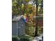 View of a neutral-colored building with fall trees in the background at 3017 Brooks Mill Ln # 10, Wingate, NC 28174