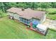 Spacious home featuring a screened porch, outdoor deck with grill, table, and chairs, perfect for relaxing and entertaining guests at 3017 Brooks Mill Ln # 10, Wingate, NC 28174