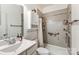 Clean bathroom featuring a white vanity, toilet, and shower-tub combination at 319 S San Agustin Dr, Mooresville, NC 28117