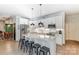 Modern kitchen with white cabinets, a spacious island, and stainless steel appliances at 319 S San Agustin Dr, Mooresville, NC 28117