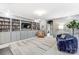 Cozy living room with built-in bookshelves, decorative furniture, and neutral colors at 319 S San Agustin Dr, Mooresville, NC 28117