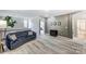 Stylish loft with comfortable seating, neutral paint, and decorative rug at 319 S San Agustin Dr, Mooresville, NC 28117