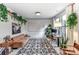 Bright home office featuring a comfortable seating area, whiteboard, and ample natural light at 319 S San Agustin Dr, Mooresville, NC 28117