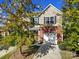 Charming two-story home with brick and siding, complemented by a one-car garage and well-maintained landscaping at 3342 Yarmouth Ln, Gastonia, NC 28056
