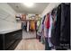 Well-organized walk-in closet with shelving and rods for ample storage at 3342 Yarmouth Ln, Gastonia, NC 28056