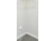 Spacious white walk-in closet with gray carpet at 3924 Dahlia Dr, Harrisburg, NC 28075