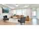 Cozy living room with a fireplace, built-in shelves, and comfortable seating at 3924 Dahlia Dr, Harrisburg, NC 28075