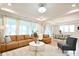 Bright, open living room with comfortable seating and a view of the dining area at 3924 Dahlia Dr, Harrisburg, NC 28075