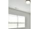 Well-lit white room with a window at 3924 Dahlia Dr, Harrisburg, NC 28075