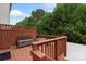 Inviting deck with wooden railings, comfortable seating, perfect for enjoying outdoor relaxation and entertaining at 4278 Park South Station Blvd, Charlotte, NC 28210