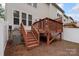 Wooden deck with stairs leading to the yard, providing an ideal outdoor space for relaxation and entertainment at 4278 Park South Station Blvd, Charlotte, NC 28210
