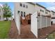 The fenced backyard features a wooden deck and provides a safe and private outdoor space at 4278 Park South Station Blvd, Charlotte, NC 28210