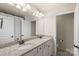 Well-lit bathroom with double sink, granite countertops, and separate toilet room at 4278 Park South Station Blvd, Charlotte, NC 28210