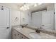 Spacious bathroom featuring a double sink vanity with granite countertops and large mirror at 4278 Park South Station Blvd, Charlotte, NC 28210