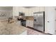 Well-appointed kitchen with granite counters, stainless oven and microwave at 4278 Park South Station Blvd, Charlotte, NC 28210