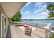 Lake views abound from this deck with outdoor seating, hammock and white railing overlooking the water at 4586 Doctor Dr, Catawba, NC 28609