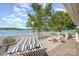 Lake views abound from this deck with outdoor seating, hammock and white railing overlooking the water at 4586 Doctor Dr, Catawba, NC 28609