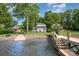 Lake house boasts a private dock and waterfront access with mature trees adding beauty to this property at 4586 Doctor Dr, Catawba, NC 28609