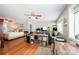 Expansive main bedroom with hardwood floors, natural light, ceiling fan, ensuite living area, and modern décor at 4586 Doctor Dr, Catawba, NC 28609