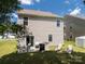 Backyard view featuring a patio seating, grill, and lounge chairs at 461 Misty Law Ln, Clover, SC 29710