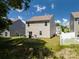 Backyard view featuring well-maintained lawn and a patio area at 461 Misty Law Ln, Clover, SC 29710