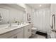 Bright bathroom features double sinks, a toilet, a shower with white tiling, and modern fixtures at 461 Misty Law Ln, Clover, SC 29710