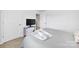 A comfortable bedroom featuring a comfy looking bed and modern television on a stand at 461 Misty Law Ln, Clover, SC 29710