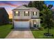Charming two-story home with a well-manicured lawn and inviting front entrance at 461 Misty Law Ln, Clover, SC 29710