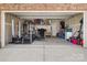 Spacious two-car garage featuring ample storage and workout equipment at 461 Misty Law Ln, Clover, SC 29710