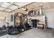 Well-organized garage area with workout equipment and overhead storage at 461 Misty Law Ln, Clover, SC 29710