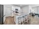 Modern kitchen boasts stainless steel appliances, a granite island, and seamless integration with the living area at 461 Misty Law Ln, Clover, SC 29710