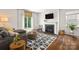 Cozy living room features a fireplace, a comfortable couch and a sliding glass door at 461 Misty Law Ln, Clover, SC 29710