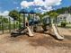 A close-up of the community playground showcasing multiple slides, climbing structures and a mulch ground at 461 Misty Law Ln, Clover, SC 29710