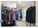 Spacious walk-in closet with ample hanging storage and shelving for organization at 461 Misty Law Ln, Clover, SC 29710