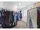 The walk-in closet has shelving for ample storage and well-organized clothing racks at 461 Misty Law Ln, Clover, SC 29710