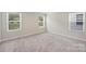 Bright bedroom with neutral carpet, multiple windows, and great natural light at 502 Tayberry Ln, Fort Mill, SC 29715