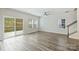 Bright living room featuring hardwood floors, a sliding glass door, and plenty of natural light at 502 Tayberry Ln, Fort Mill, SC 29715