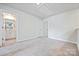Loft area featuring neutral carpet and access to a full bathroom at 502 Tayberry Ln, Fort Mill, SC 29715