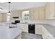 Classic kitchen with black appliances and ample cabinet space at 511 Brookwood Dr, Statesville, NC 28677