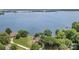 Picturesque aerial view of waterfront property boasting lush greenery and a tranquil lake setting at 5114 Leisure Ln, Sherrills Ford, NC 28673
