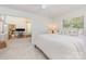 Spacious bedroom with an adjacent office area, neutral walls, and plush carpet at 5114 Leisure Ln, Sherrills Ford, NC 28673