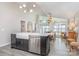 Bright, open kitchen featuring stainless steel appliances, modern lighting and gorgeous lake views at 5114 Leisure Ln, Sherrills Ford, NC 28673